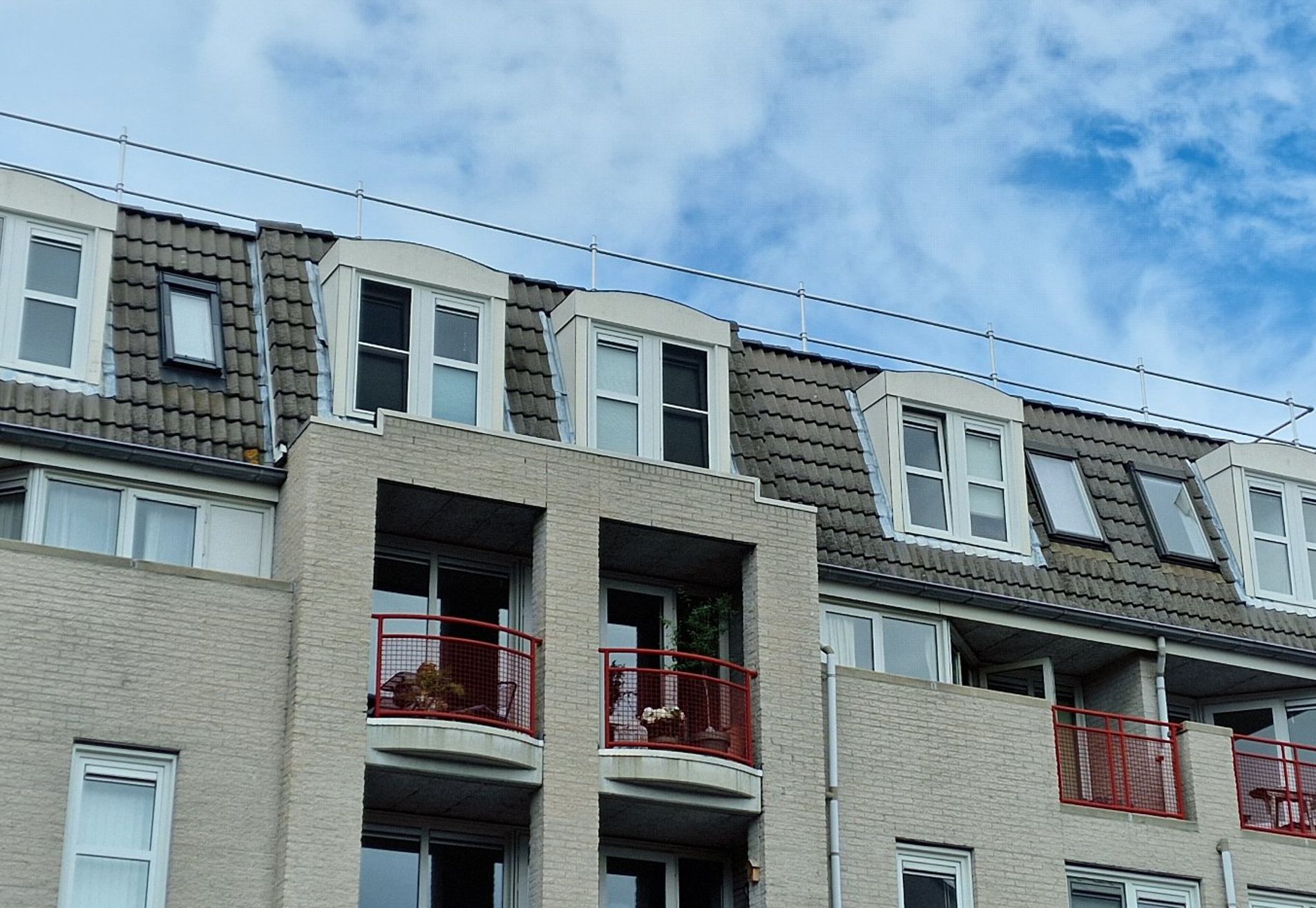 Buitenschilderwerk VvE Gouda – Onderhoud aan 12 dakkapellen