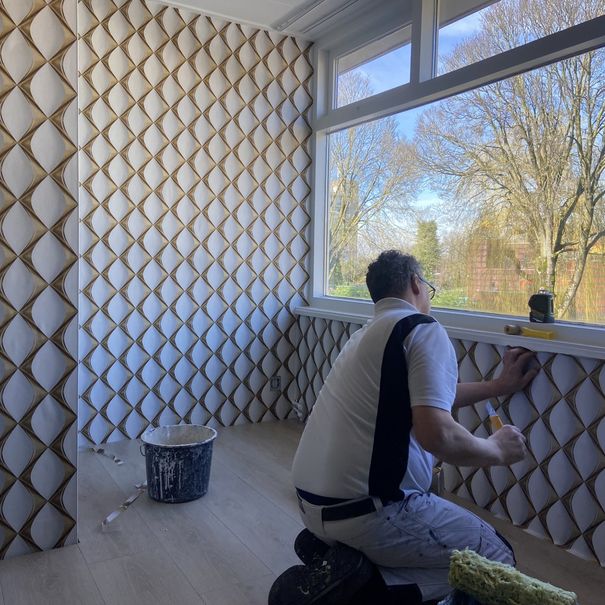 Behangen en wandafwerking Behangen en wandafwerking